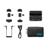 GoPro Wireless Mic Complete Kit contents laid out: two transmitters, two receivers, charging case, cables and pouch.