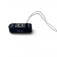 Underside of the ULANZI OA26 with a thin cord threaded and knotted through one of the tether holes.