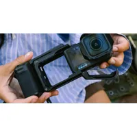 GoPro Point-and-Shoot Grip hinged frame door open, showing quick camera insertion.