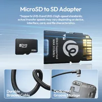The included UHS-II microSD to SD adapter, braided cable, and the moulded recess the USB-C connector clips into.