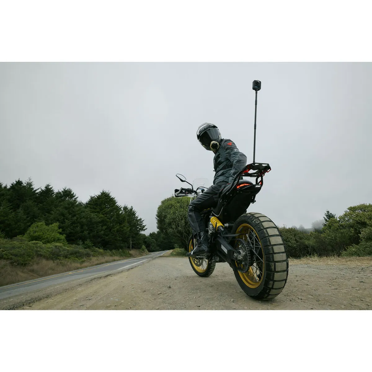 GoPro Carbon Fibre Extension Rod Set with a 360 Camera mounted on a motorbike.