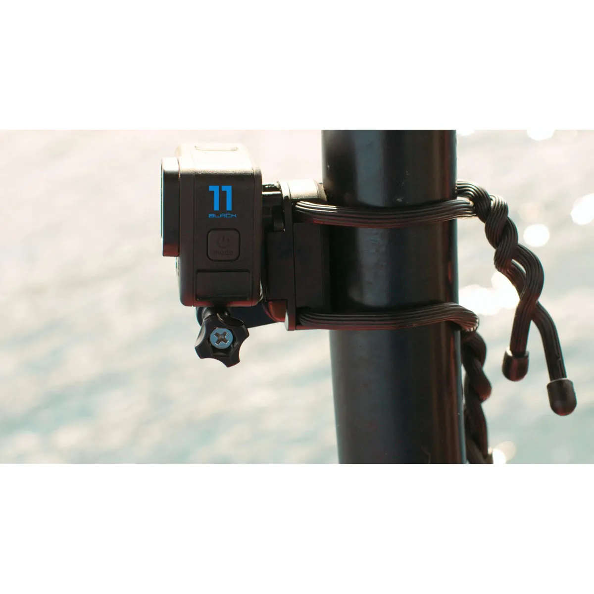 GoPro Flexible Grip Mount gripping a thick black pole with an action camera mounted.