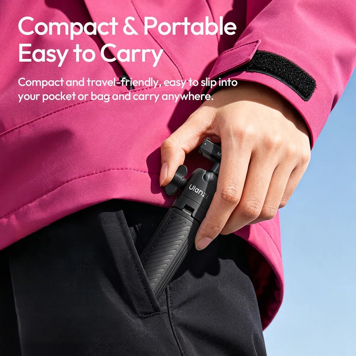 The folded ULANZI ClipMate being slipped into a pocket, showing how compact it is at 15.6cm.