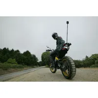 GoPro Carbon Fibre Extension Rod Set with a 360 Camera mounted on a motorbike.