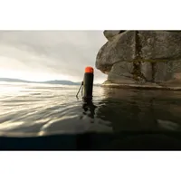 GoPro 80cm Floating Extension Pole floating in water with orange endcap visible above the surface.