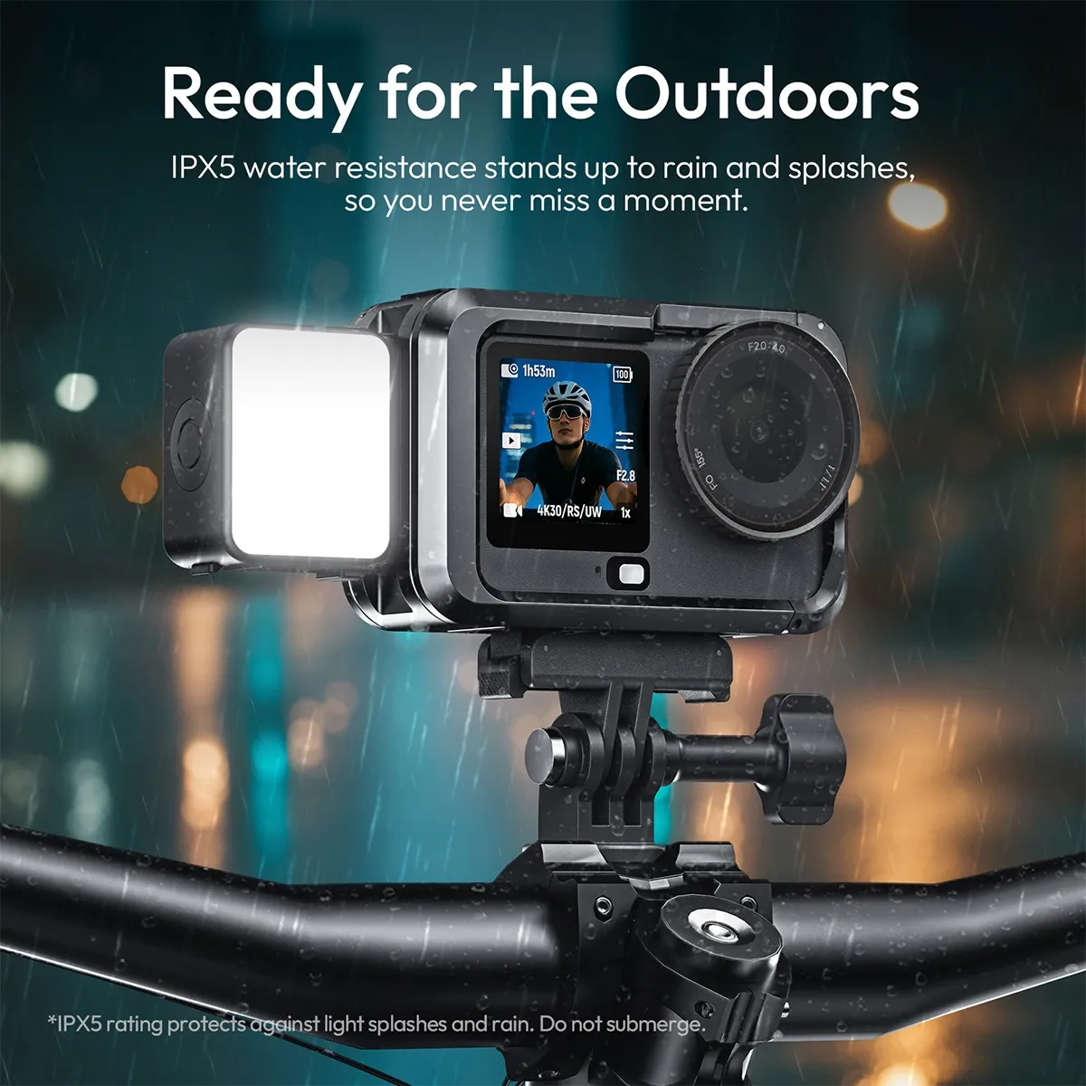 ULANZI LM24 fitted to an action camera on bike handlebars in the rain, rated IPX5 for splashes.