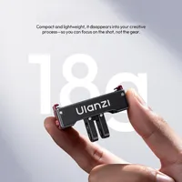 ULANZI OA24 magnetic latch adapter held between two fingers, weighing 18 grams.